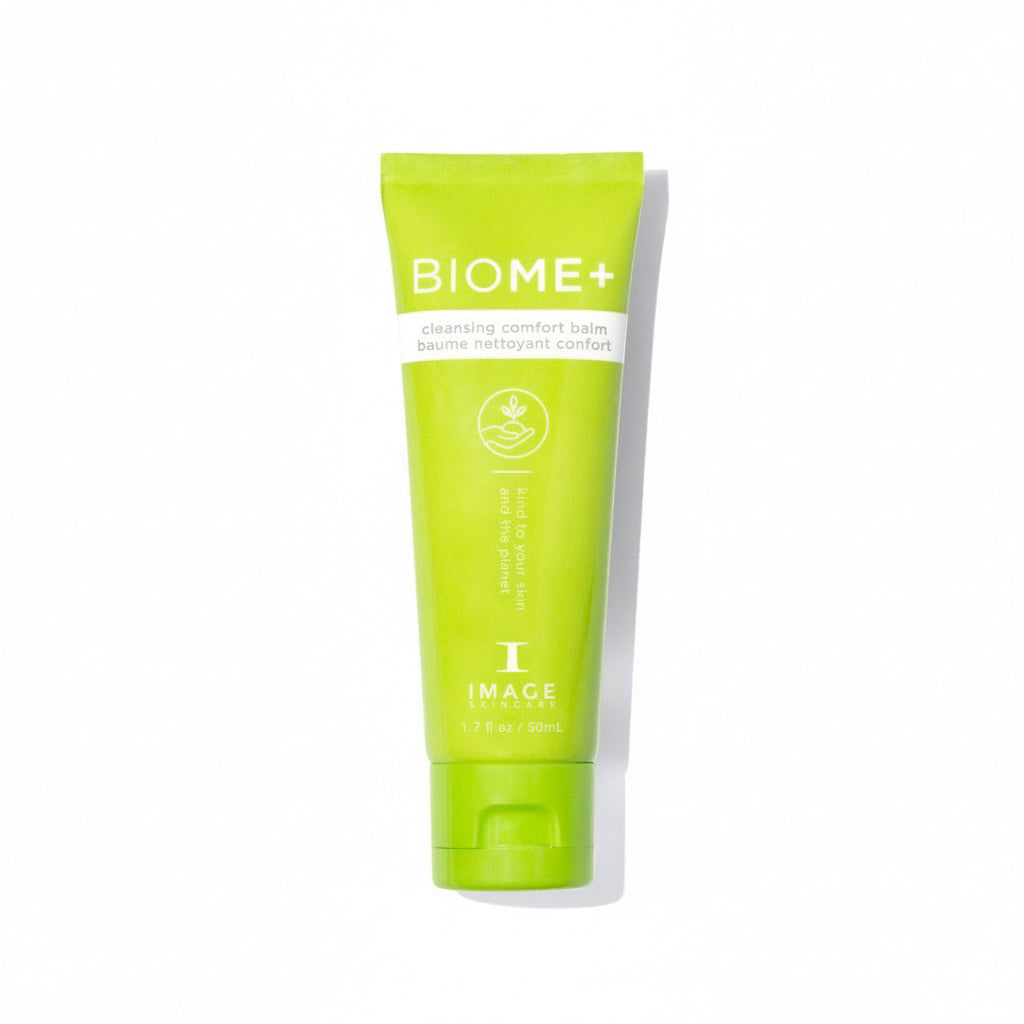 Green tube of BIOME+ cream on a white background