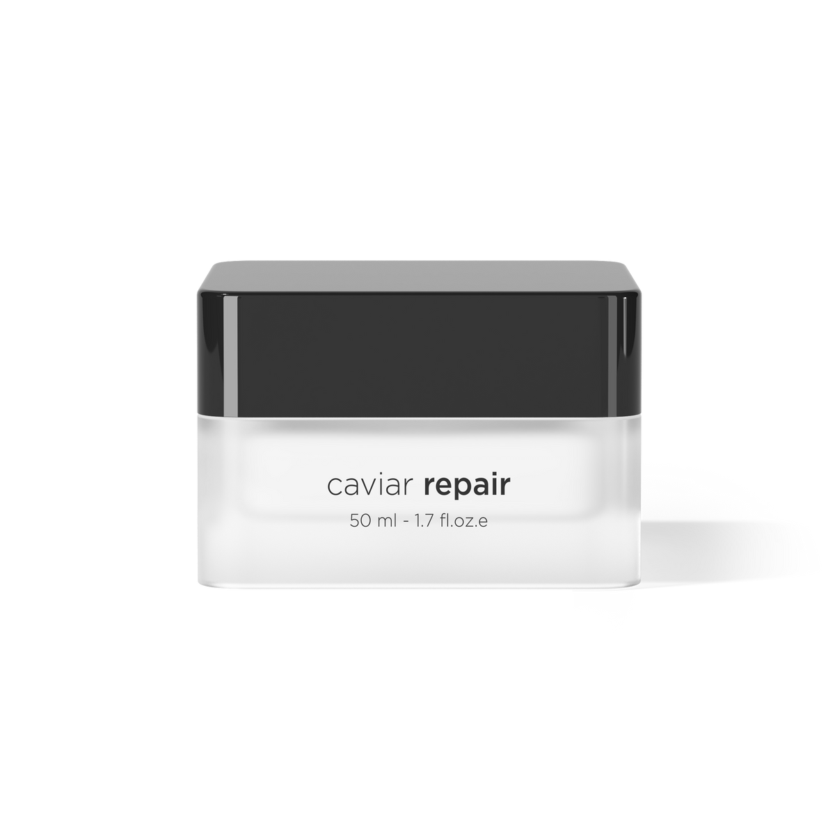 A clear cosmetic jar with a glossy black lid, labeled 'caviar repair' and '50 ml - 1.7 fl oz e', centered on a clean white background.