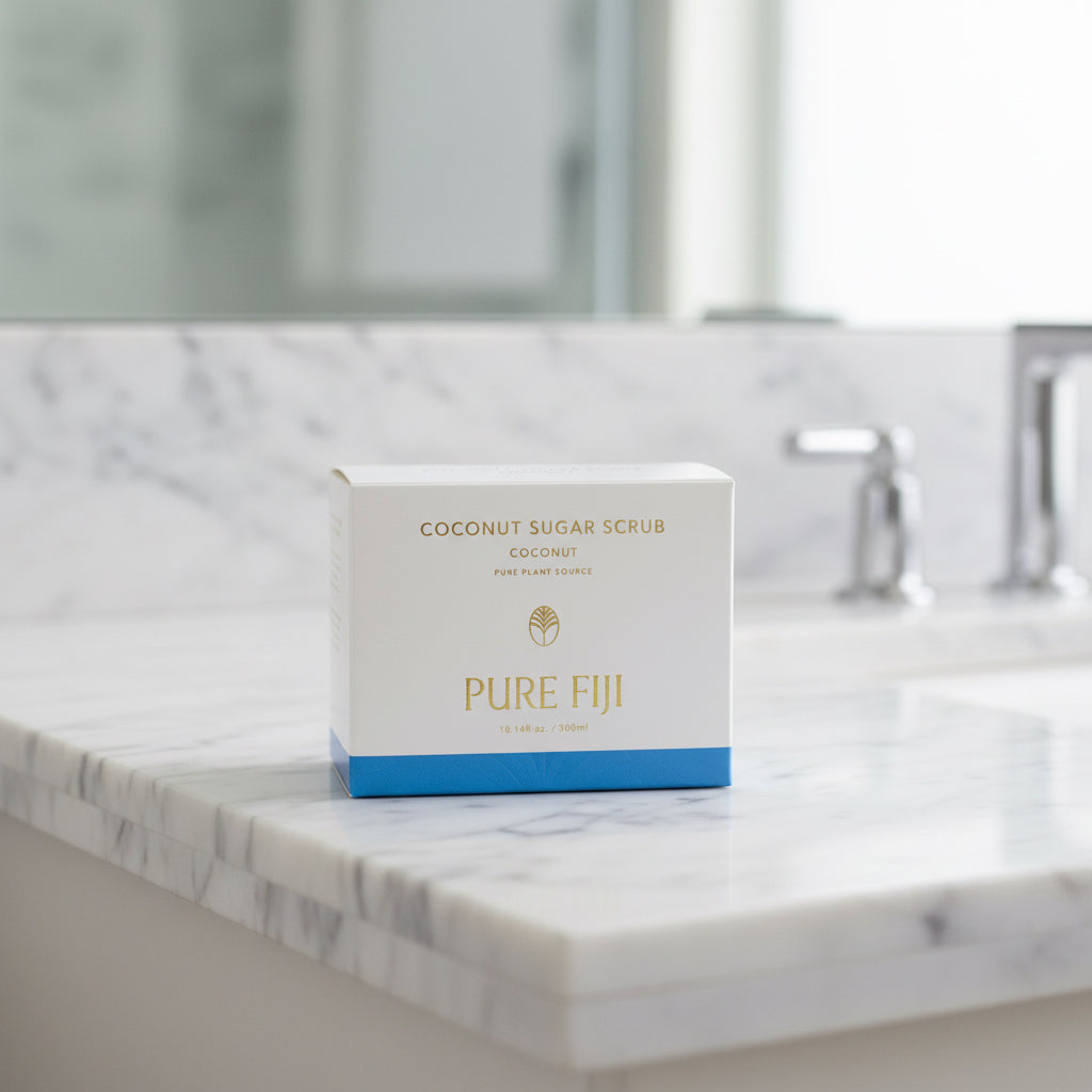 A jar of Pure Fiji Coconut Sugar Scrub, with the brand's logo and product name visible.