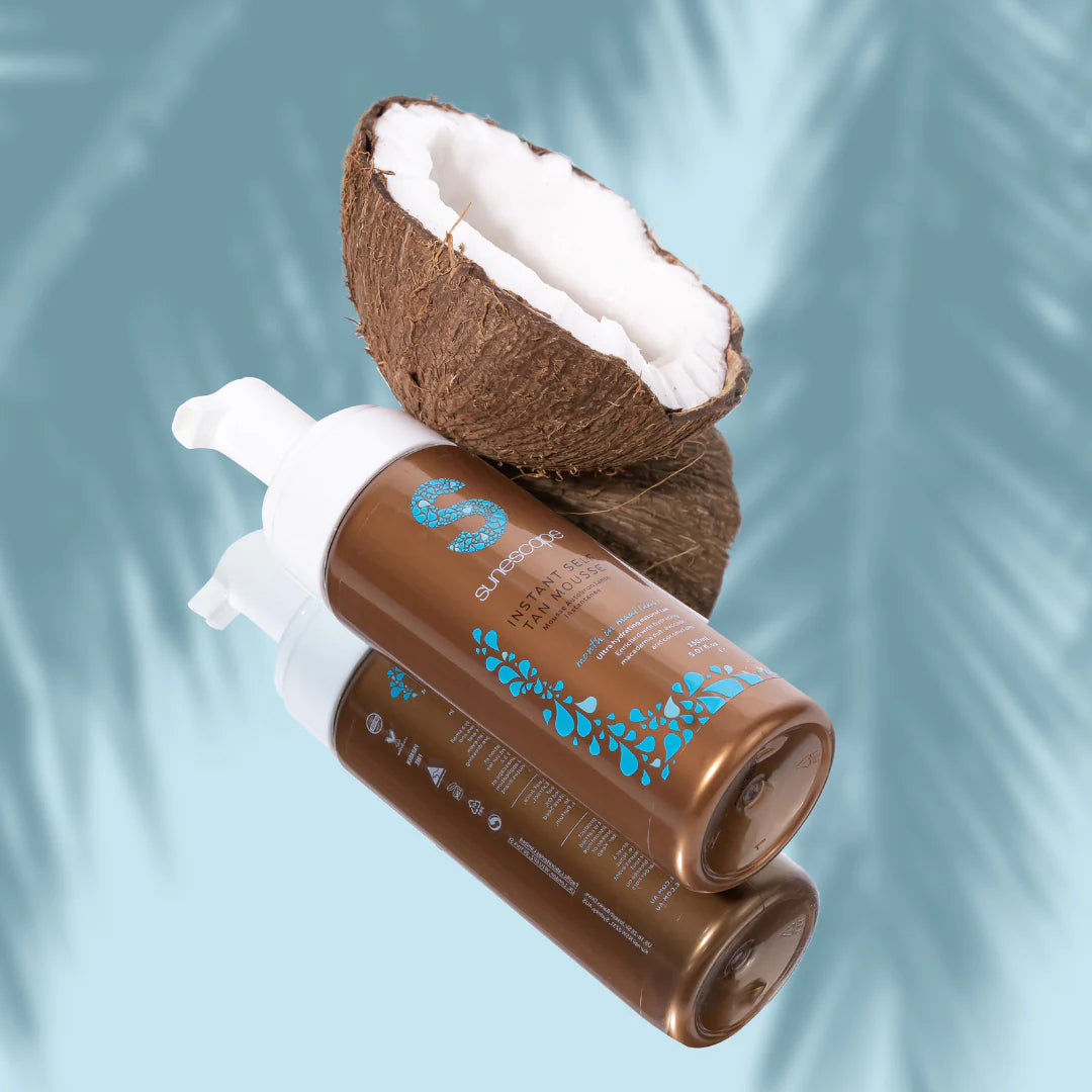 Sunescape brown bottle with white cap and a coconut on a light blue background