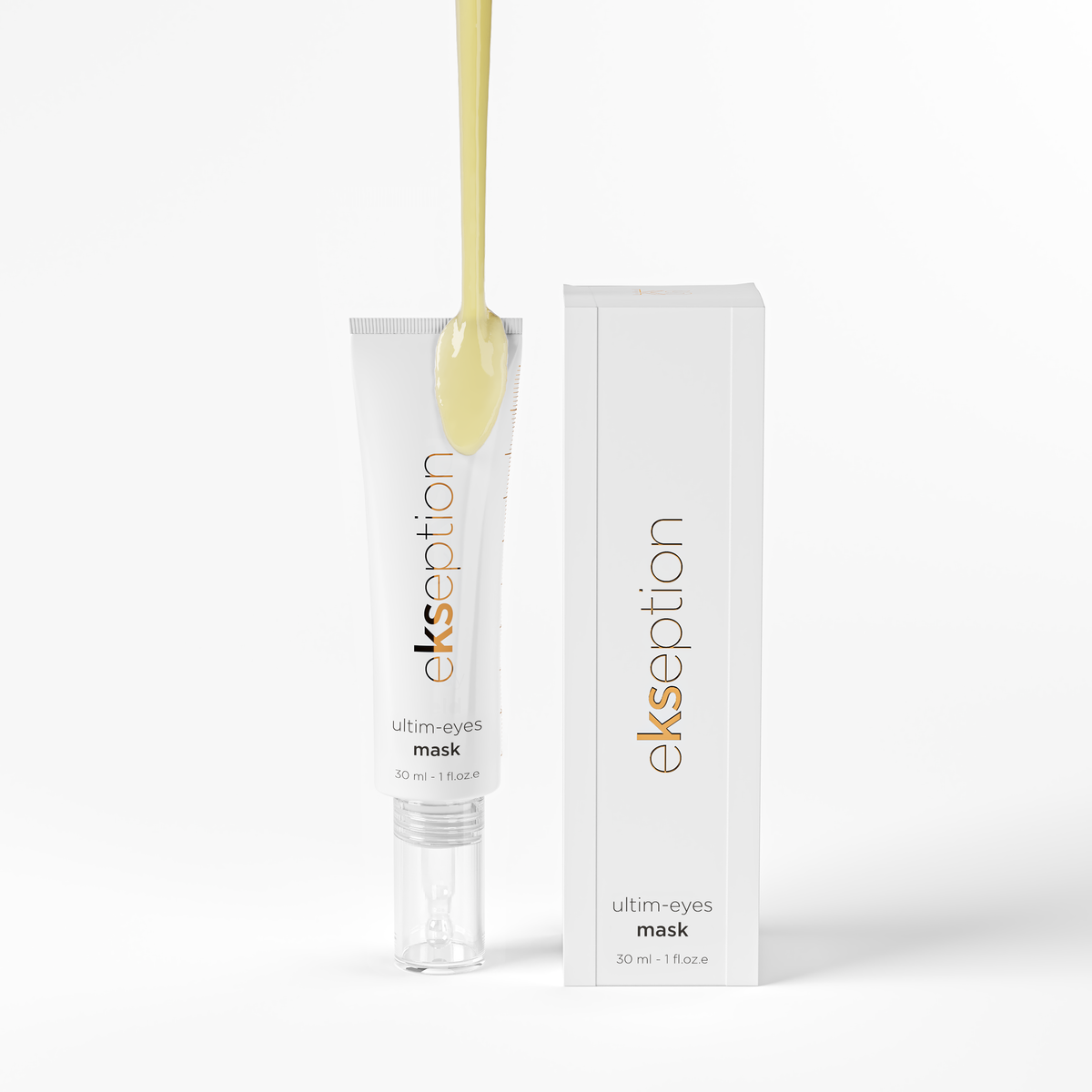 A white tube of ekseption ultim-eyes mask stands next to its matching white box on a clean white background, with a thick golden-yellow gel being dispensed from a dropper above the tube.