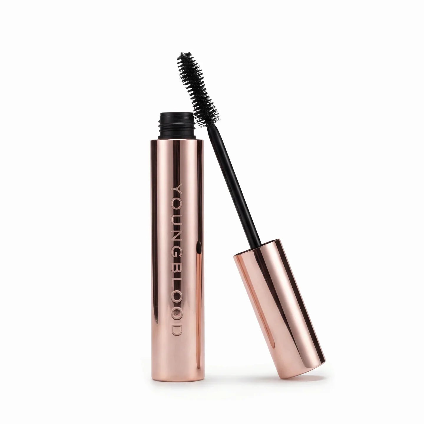 Youngblood Til Midnight Mascara with rose gold casing and black wand on a white background