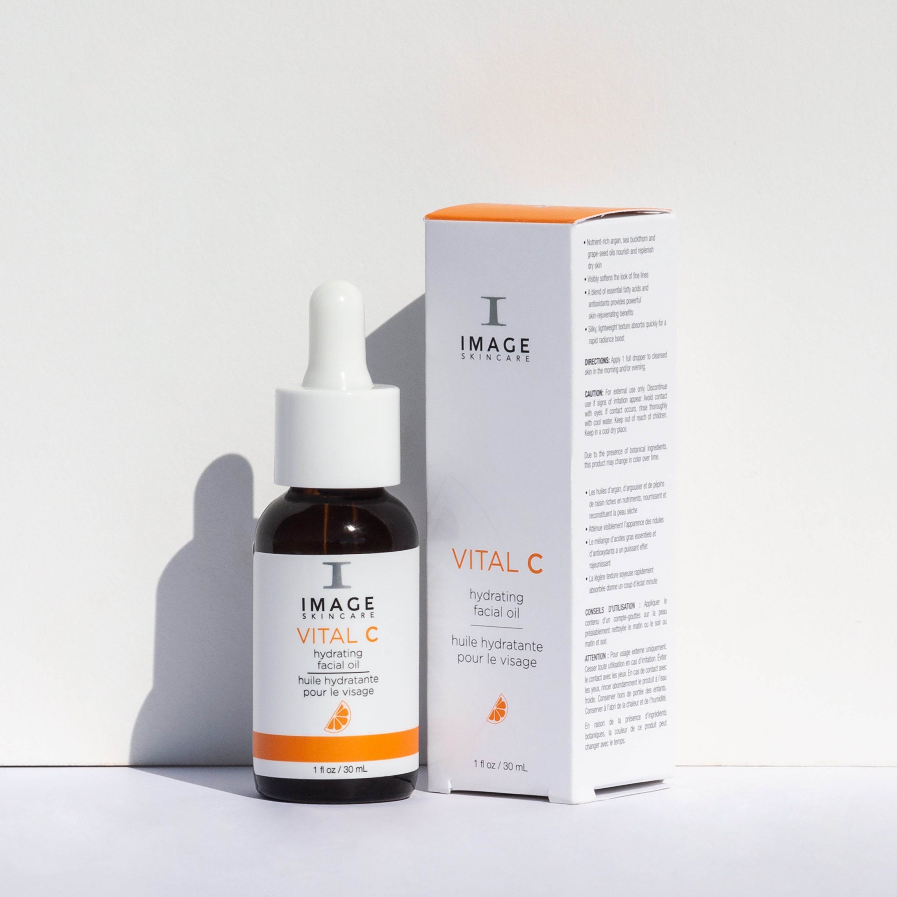 Bottle of Image Skincare Vital C Hydrating Facial Oil with packaging on a white background