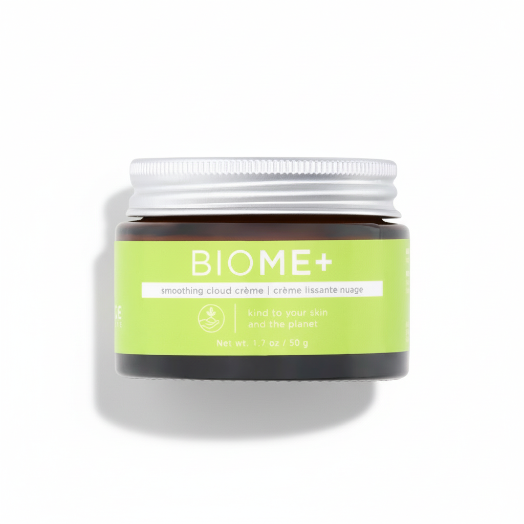 Biome+ cream jar with green label on a white background