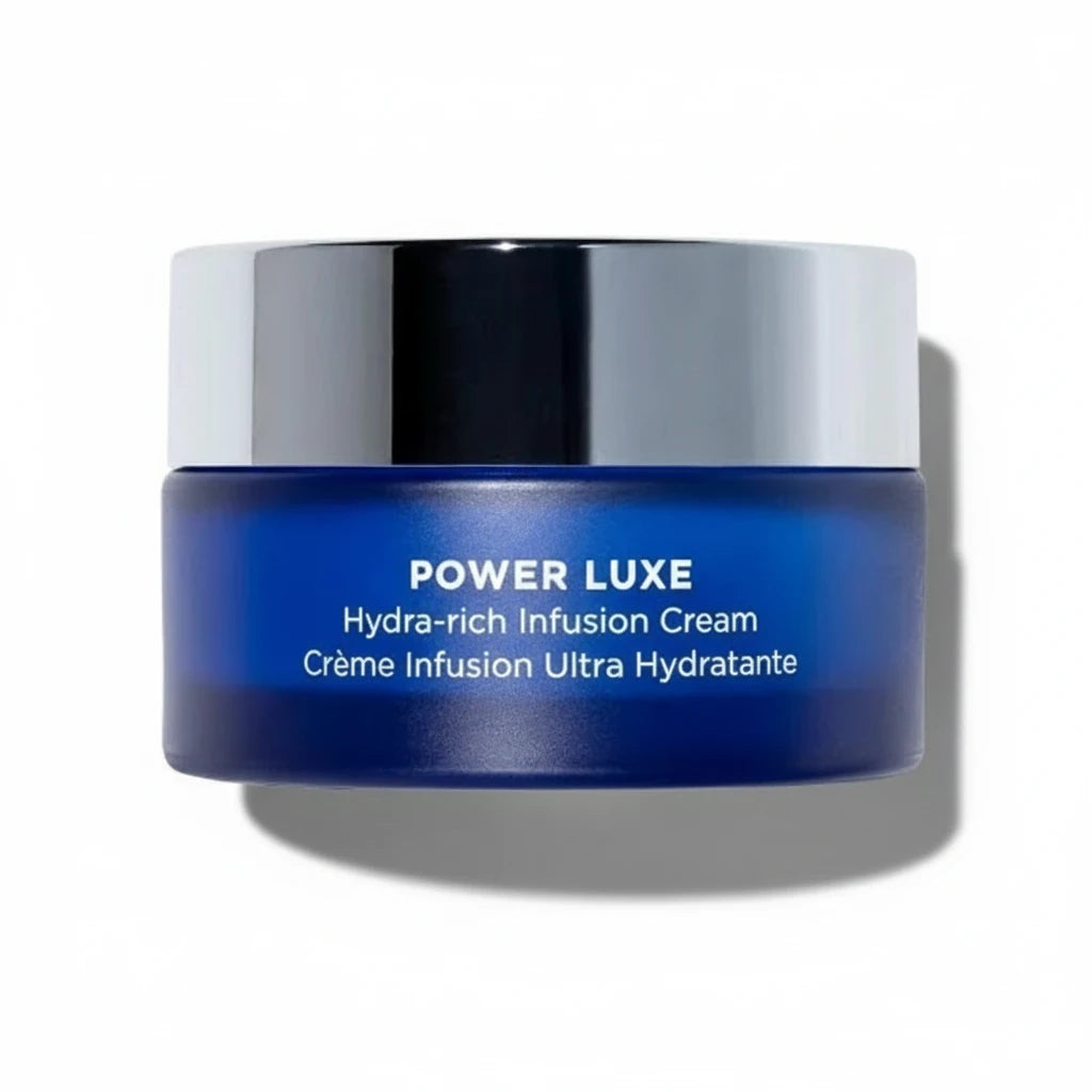 A jar of Power Luxe Hydra-rich Infusion Cream by Hydropeptide, primarily blue in color with a white lid, labeled for intensive overnight hydration and skin firmness.