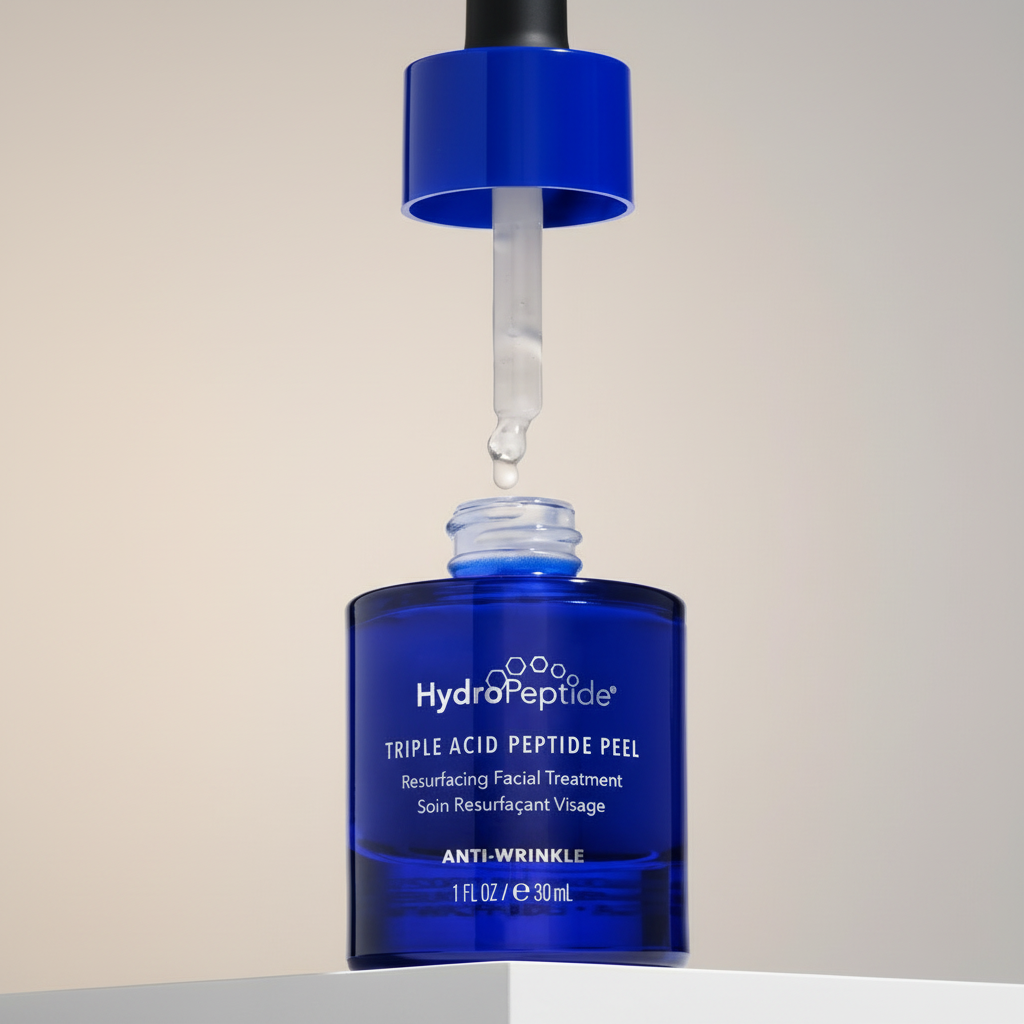 Blue HydroPeptide skincare bottle with dropper on a white background