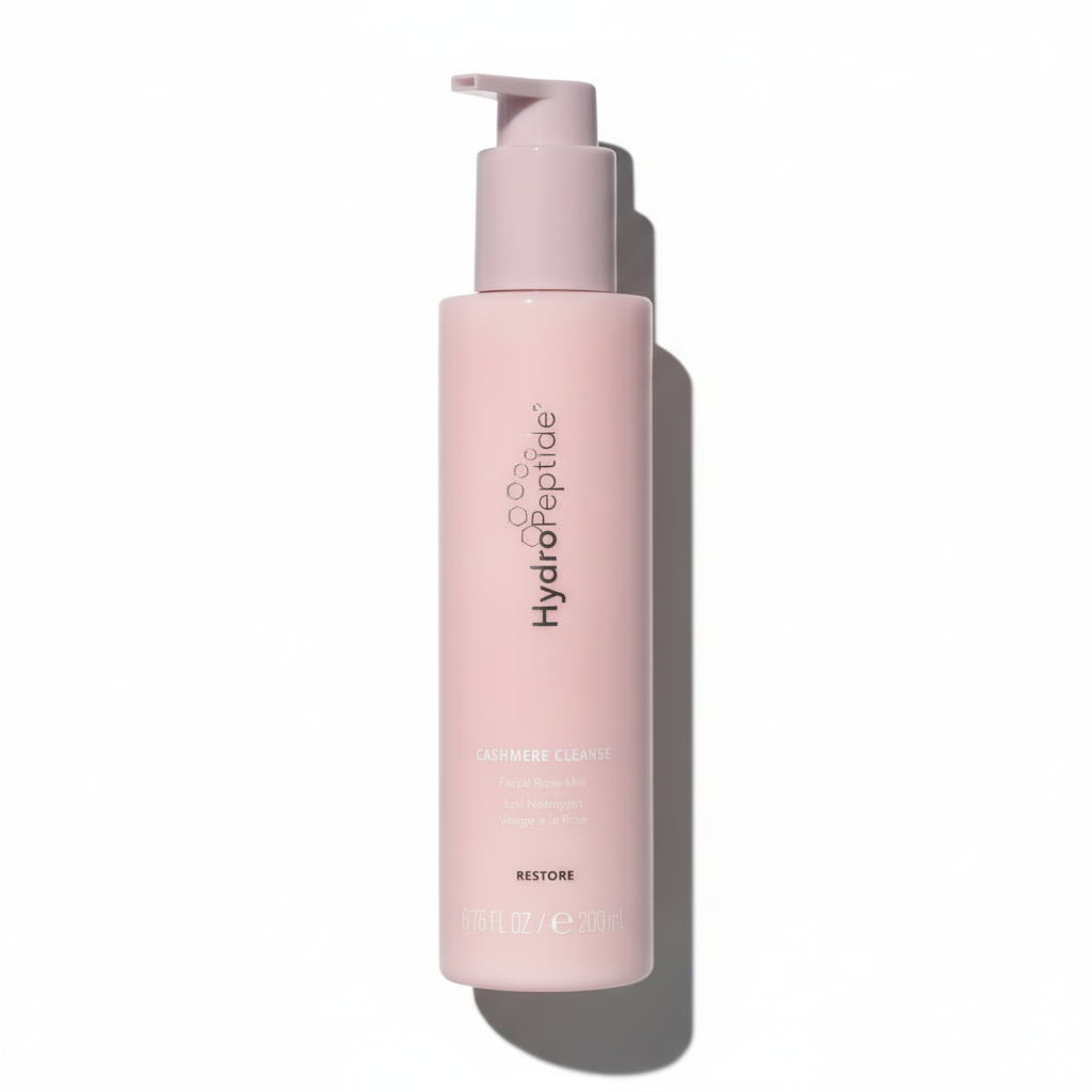 Pink bottle with pump HydroPeptide Cashmere Cleanseon a white background