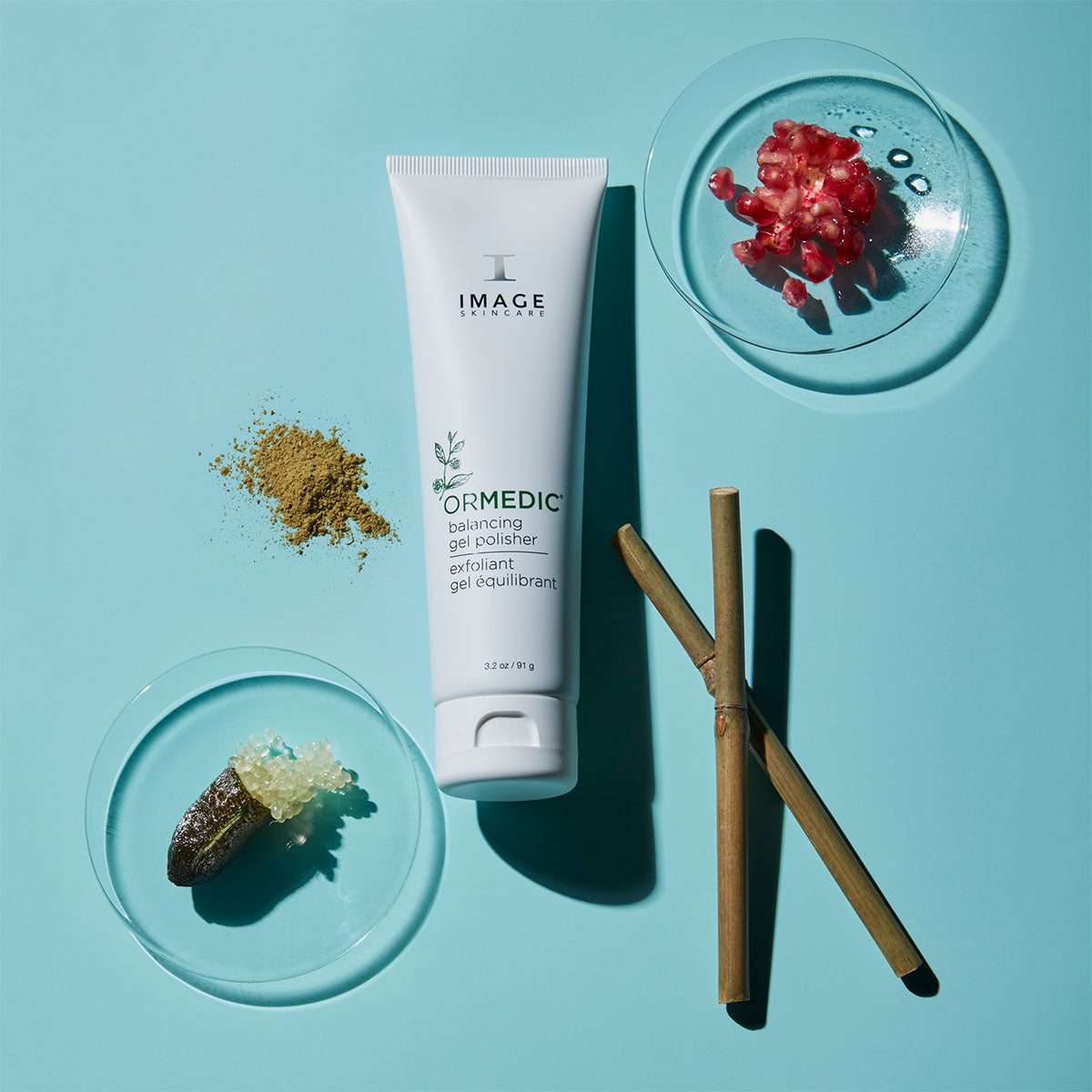 Tube of Image Skincare product on a blue background with natural elements