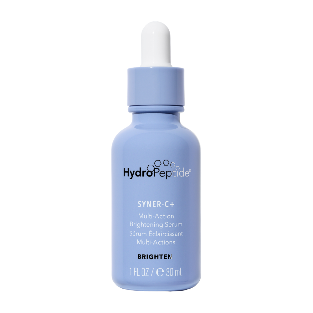 A 30 mL dropper bottle of HydroPeptide Syner-C+ Brightening Serum in a light periwinkle blue color with a white dropper cap, shown on a solid white background.