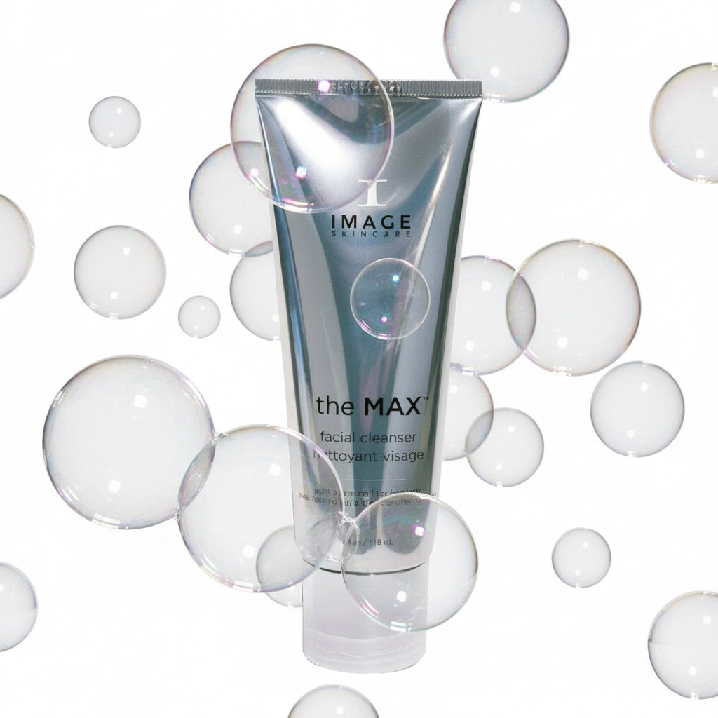 A tube of the MAX Stem Cell Facial Cleanser by IMAGE Skincare, with a silver and white color scheme.