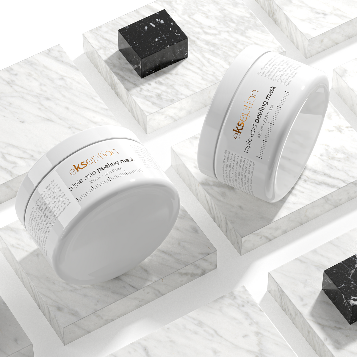 Two white cosmetic jars labeled 'ekseption triple acid peeling mask' arranged on white marble display blocks, with a few black marble cubes around them on a white background.