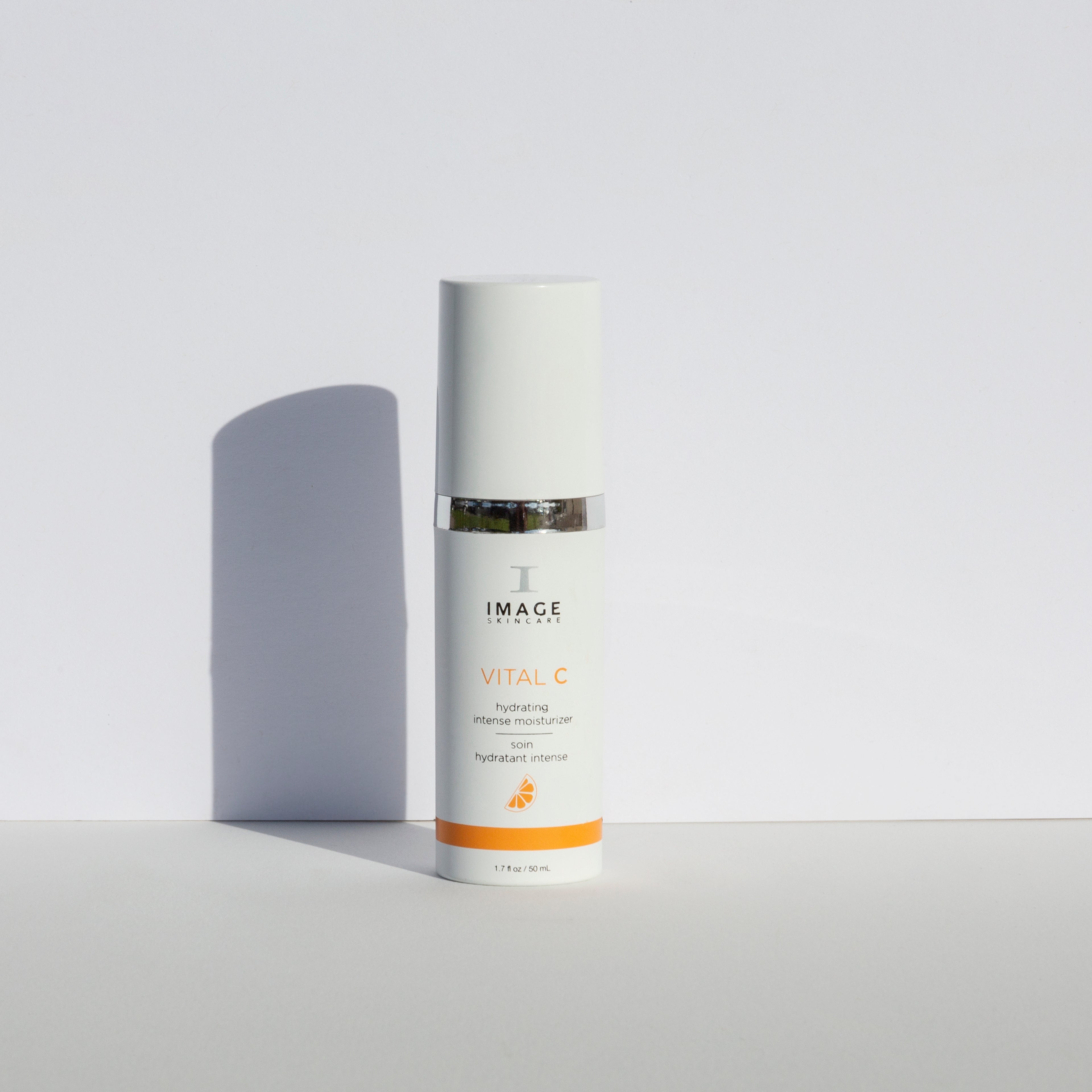 Skincare bottle labeled 'IMAGE' on a light gray background