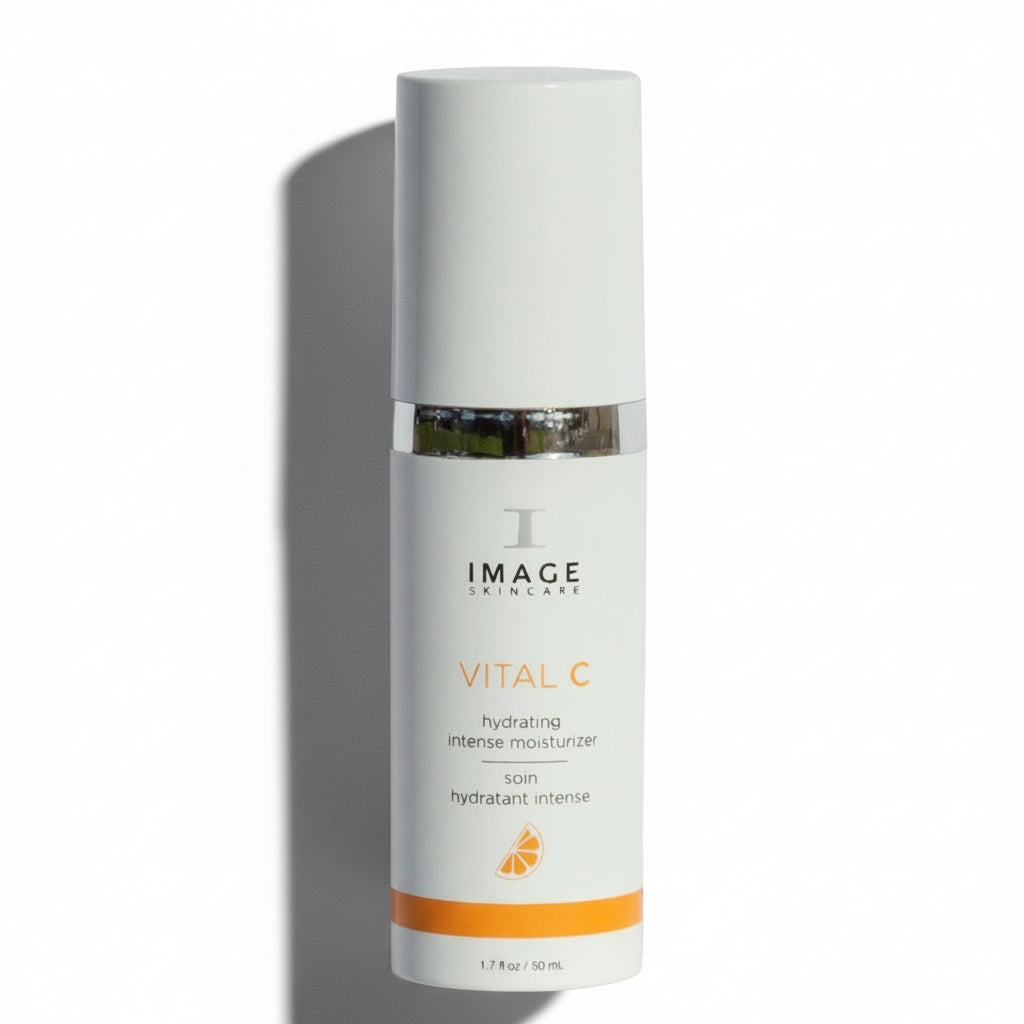 A bottle of IMAGE Vital C Hydrating Intense Moisturiser with a white and orange label, designed for skincare use.